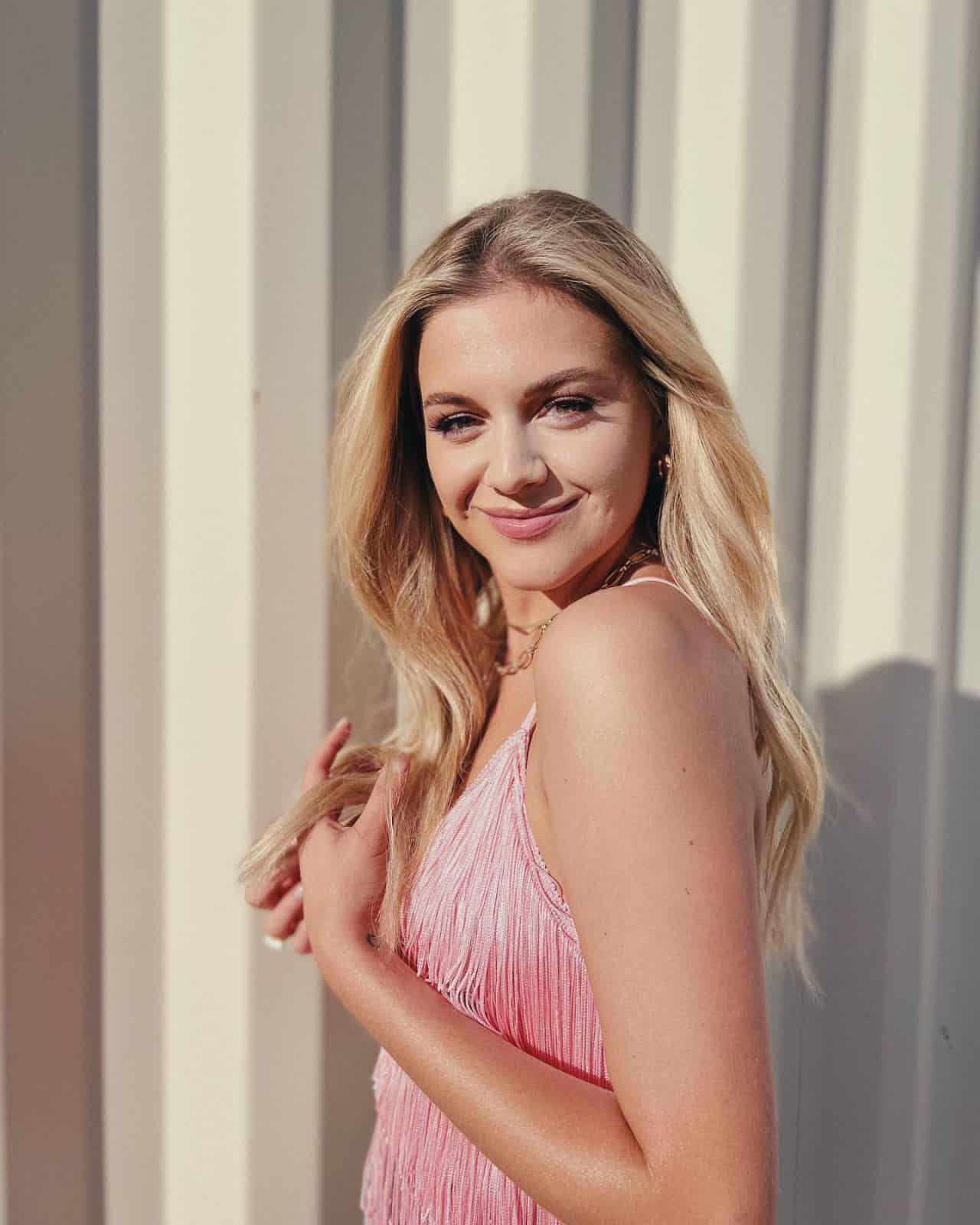 Kelsea Ballerini Posing in a Variety of Outfits on Social Media