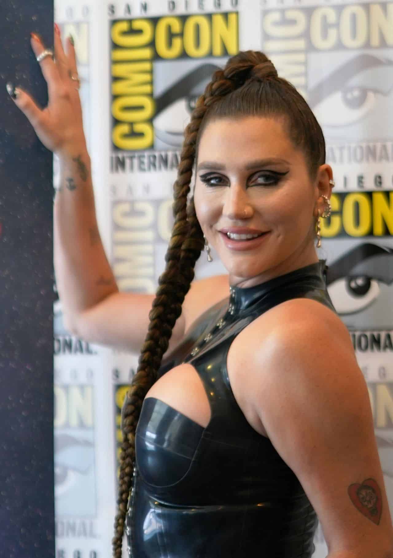 Kesha in Black Outfit at Discovery+ "Conjuring Kesha" Press Line at SDCC