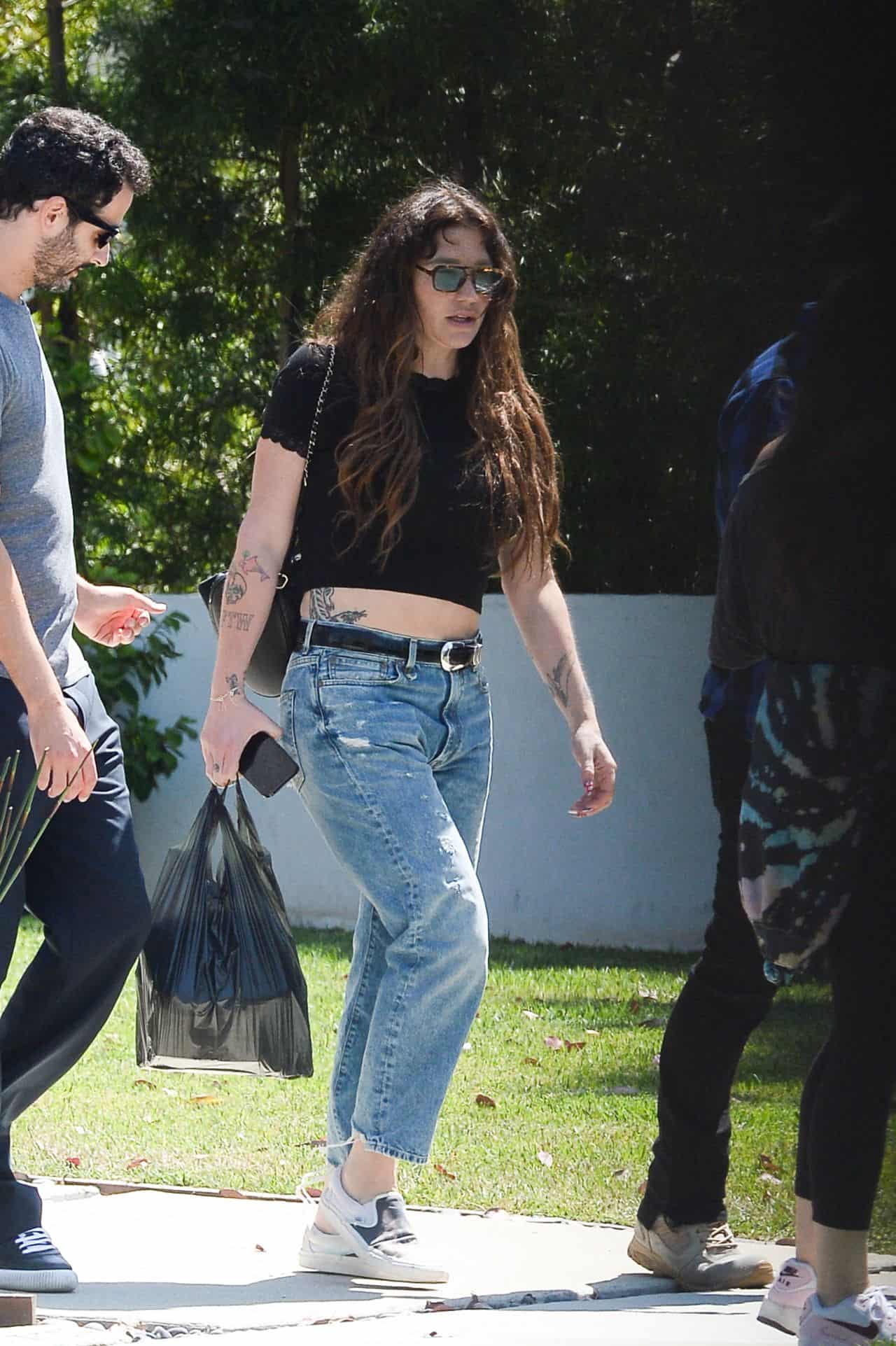 Kesha Looks Cozy in a Black Crop Top and Jeans while Running Errands in LA