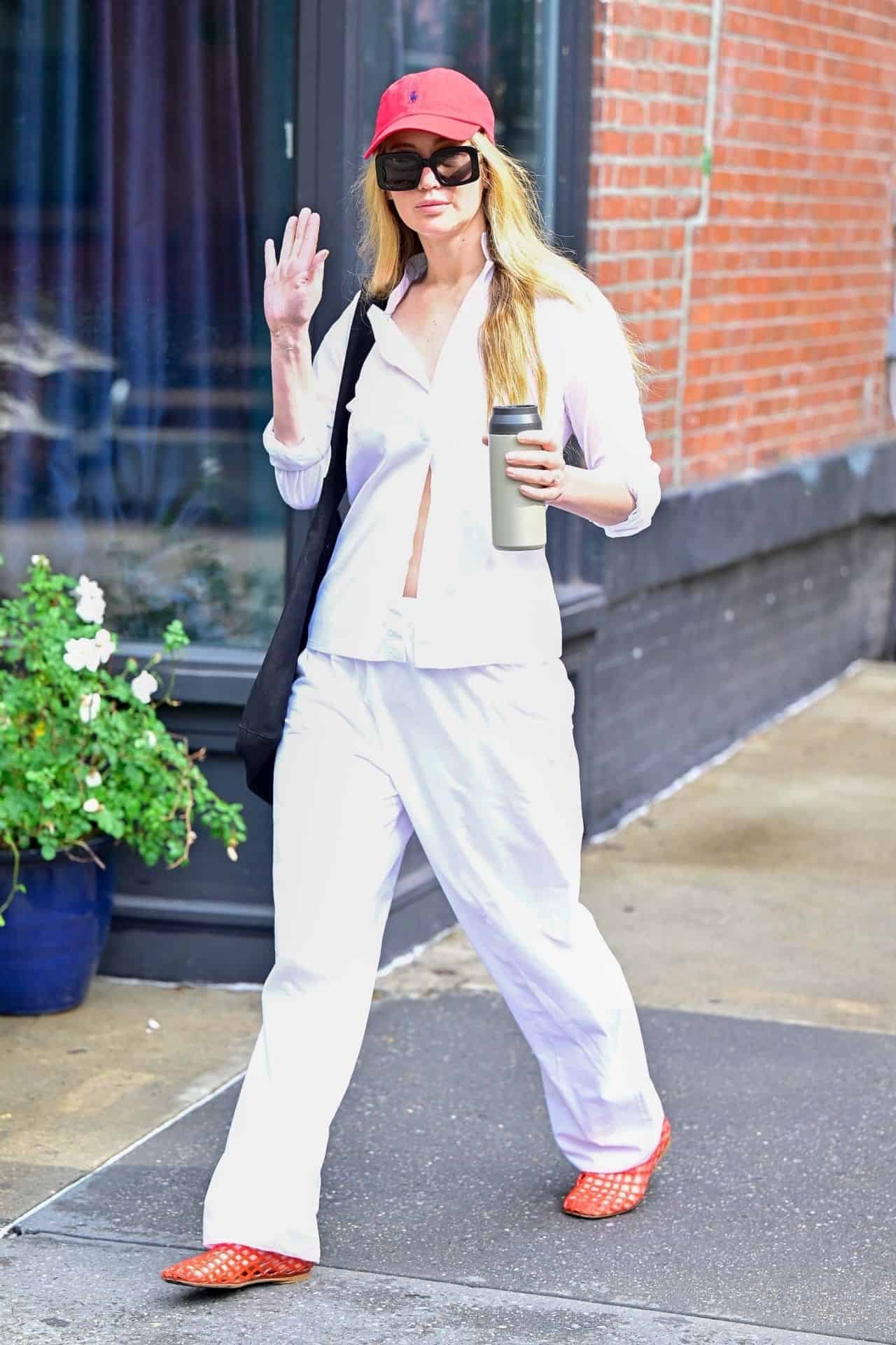 Jennifer Lawrence Runs Errands in All White with Red Mesh Shoes in New York - 06-26-2024 - 1