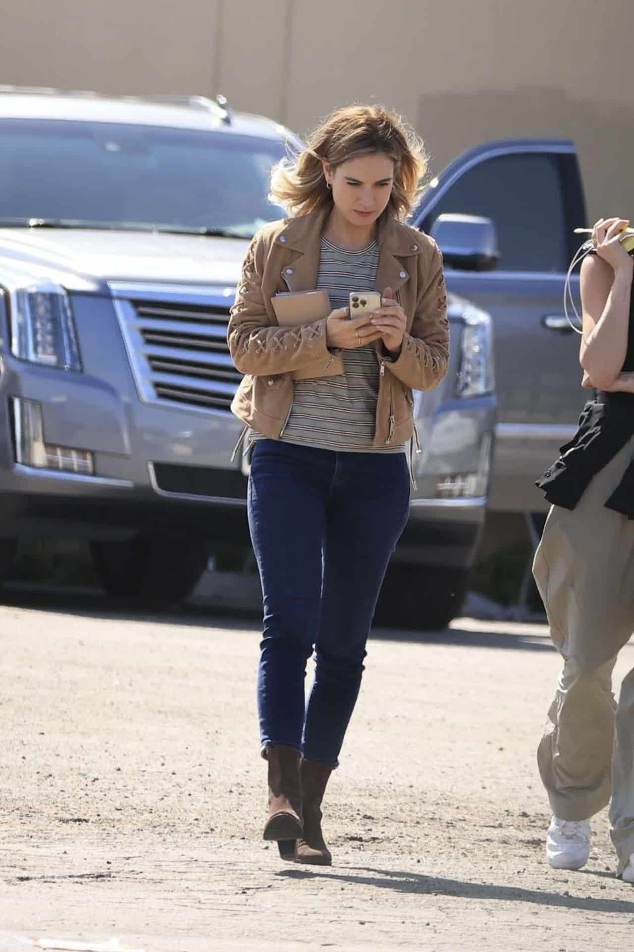 Lily James Keeps Swiping Away on Set for Film Swiped 06-10-2024 - 1