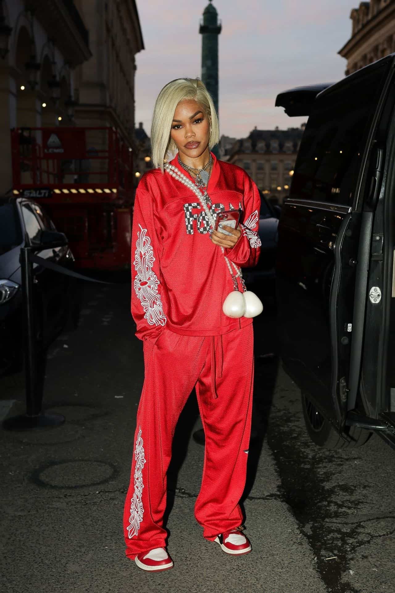 Teyana Taylor Stuns in a Red Tracksuit at Place Vendome During Paris Fashion Week - 06-26-2024 - 1