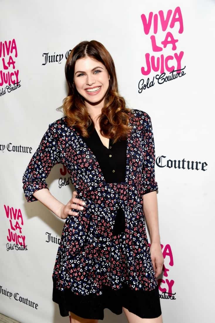 Alexandra Daddario Poses at the Viva La Juicy Gold Couture Launch Event - 1