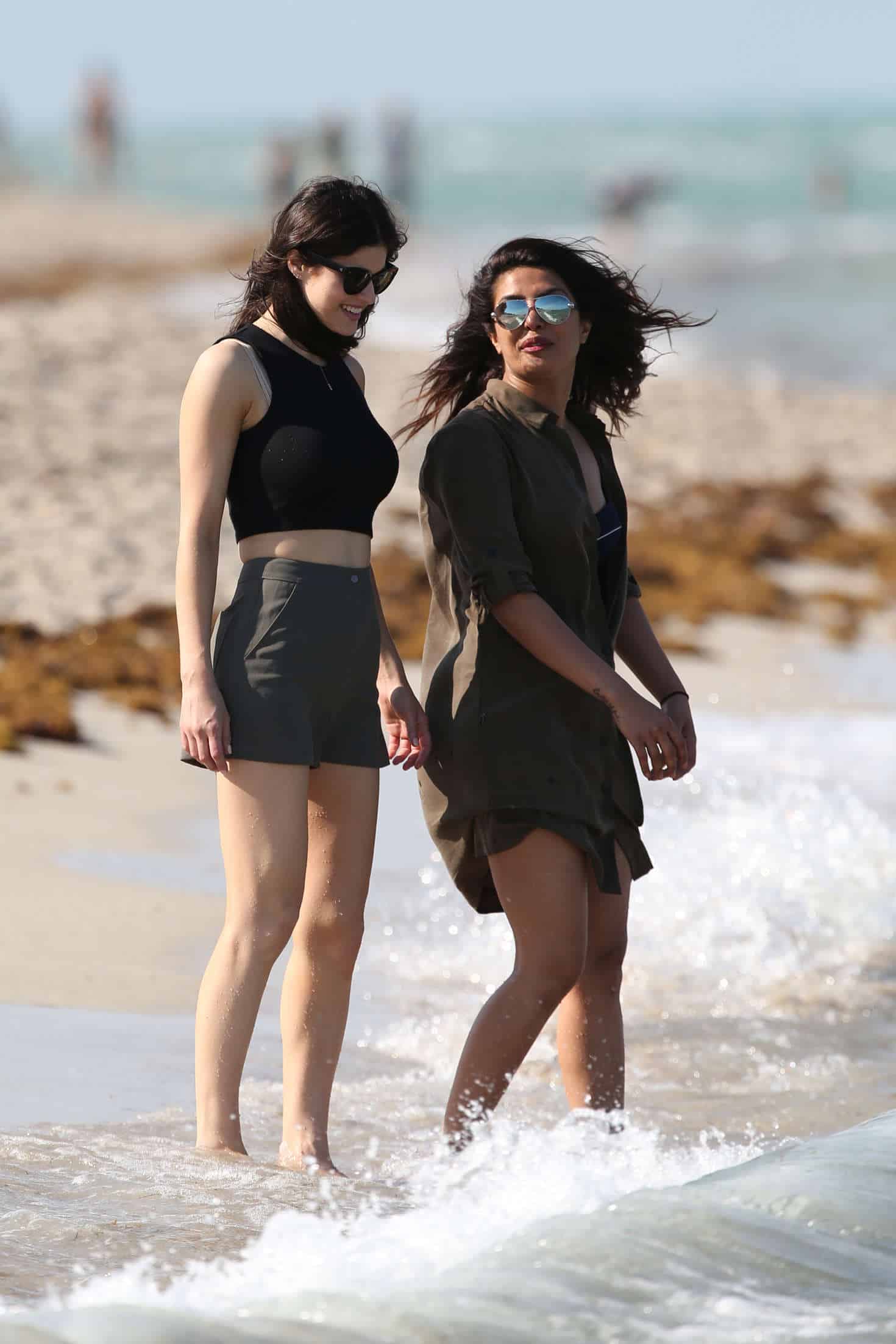 Alexandra Daddario Stuns in Green Shorts on the Beach in Miami - 1