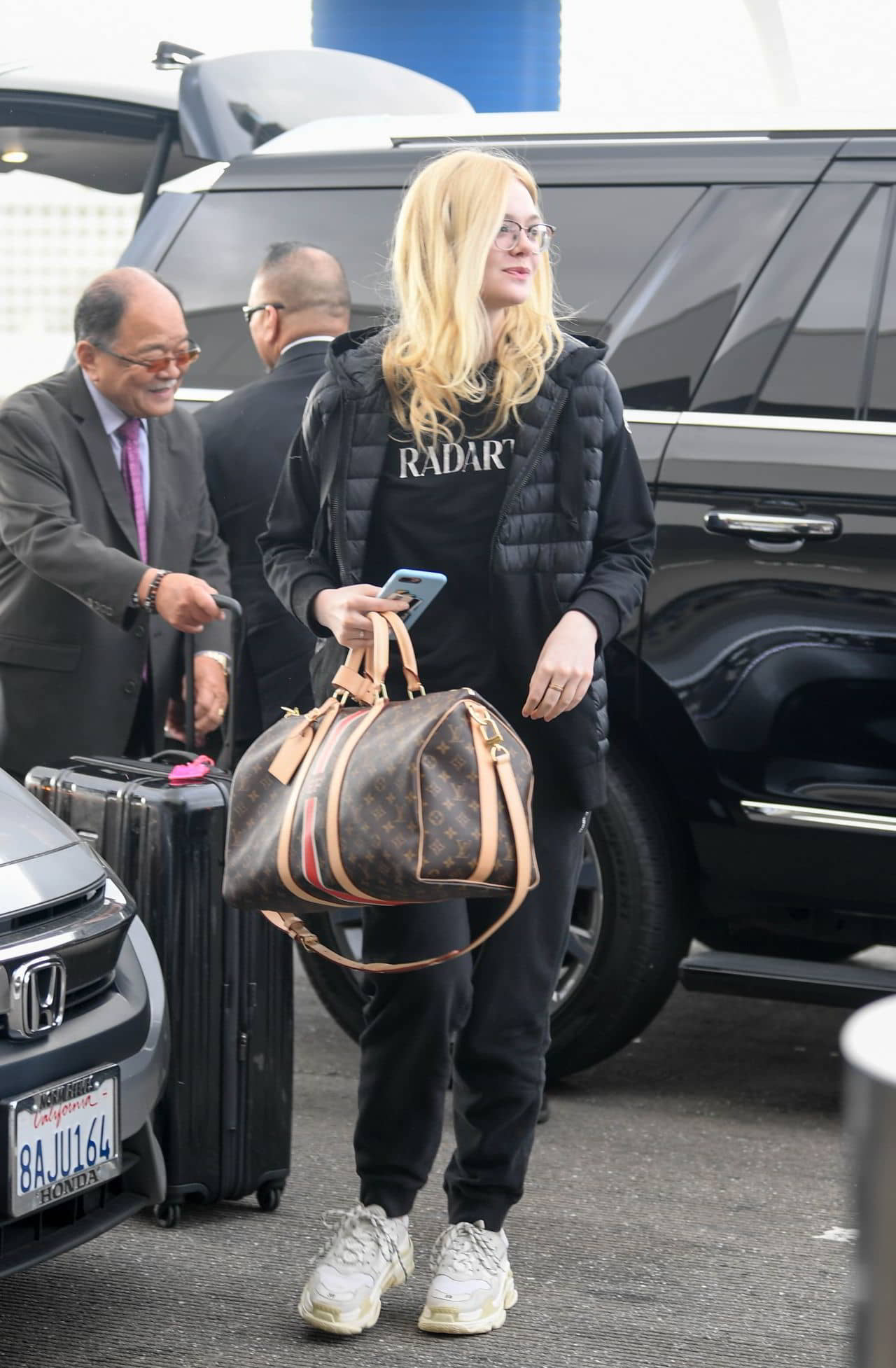 Elle Fanning's Travel Style at LAX Airport in Los Angeles, April 3, 2019 - 1