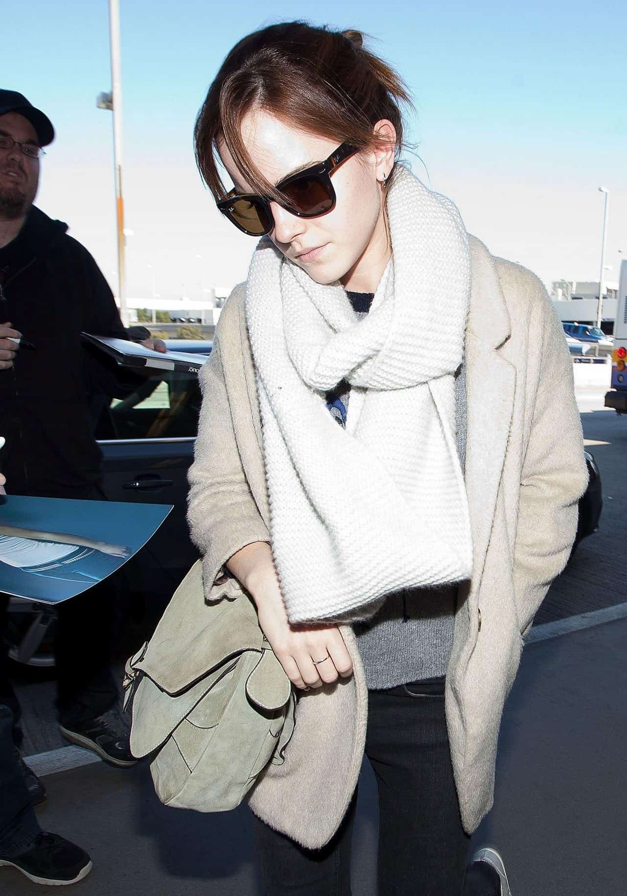 Emma Watson Arrives Effortlessly Chic at LAX Airport - 1