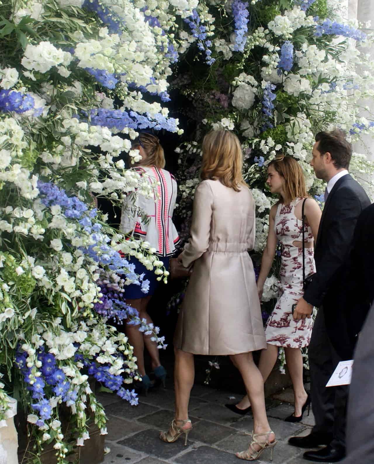 Emma Watson Fashion-Forward in Modest Dress at Friend's Wedding - 1