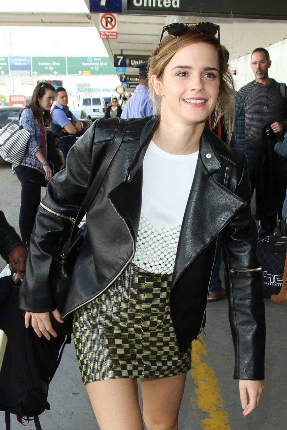 Emma Watson's Edgy Look - Green Mini Skirt and Biker Jacket at LAX Airport - 1