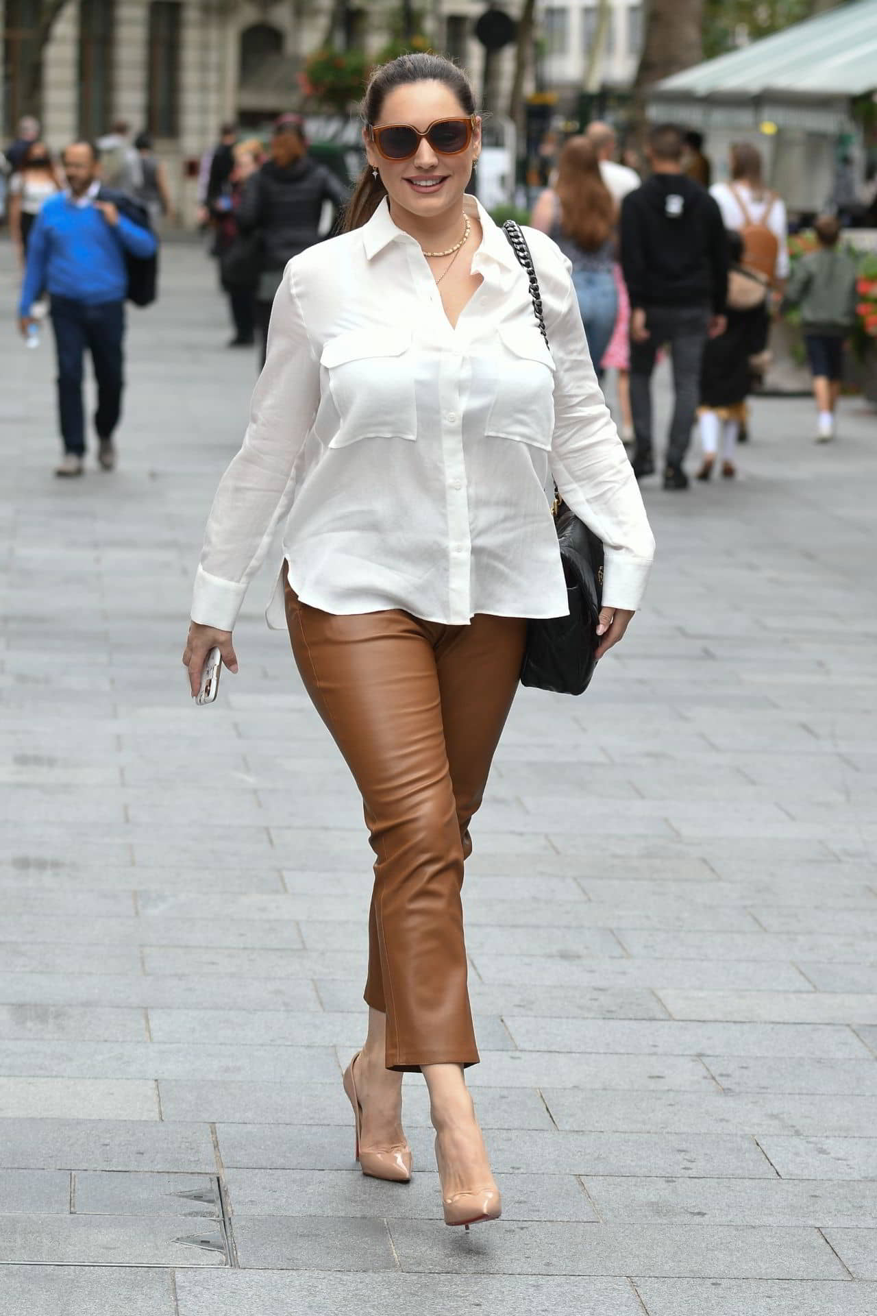 Kelly Brook in Brown Leather Trousers and Nude Heels in London, September 2, 2020