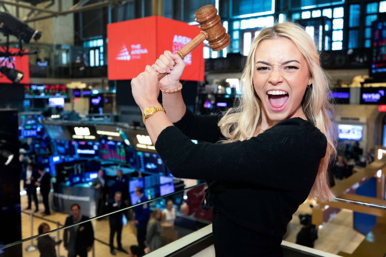 Olivia Dunne, Brooks Nader, and Yumi Nu Ringing The Opening Bell at The New York Stock Exchange with Sports Illustrated Swimsuit, May 18, 2023 - 1