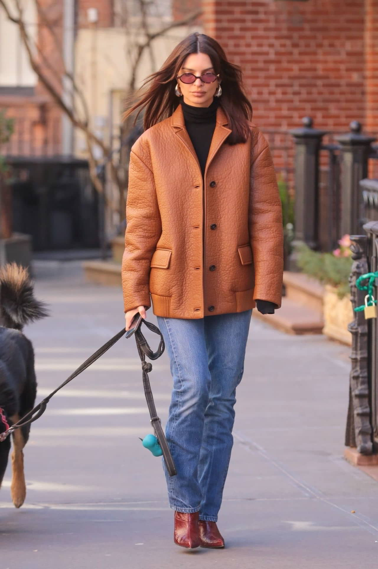 Emily Ratajkowski in a Leather Jacket, Skinny Jeans, and Burgundy Booties in NYC, February 8, 2024 - 1