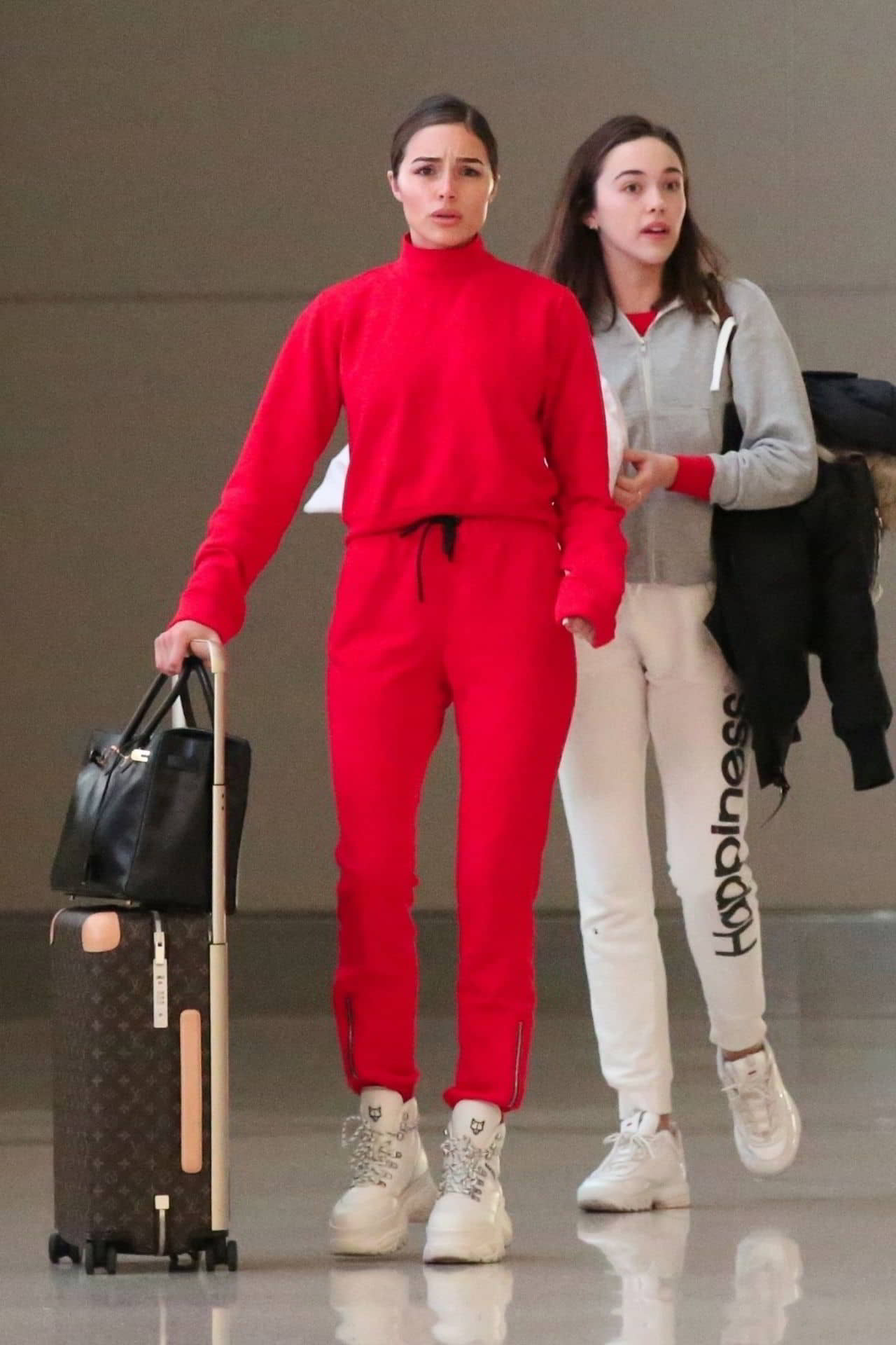 Olivia Culpo in a Red Ensemble at LAX in Los Angeles, January 10, 2019 - 1