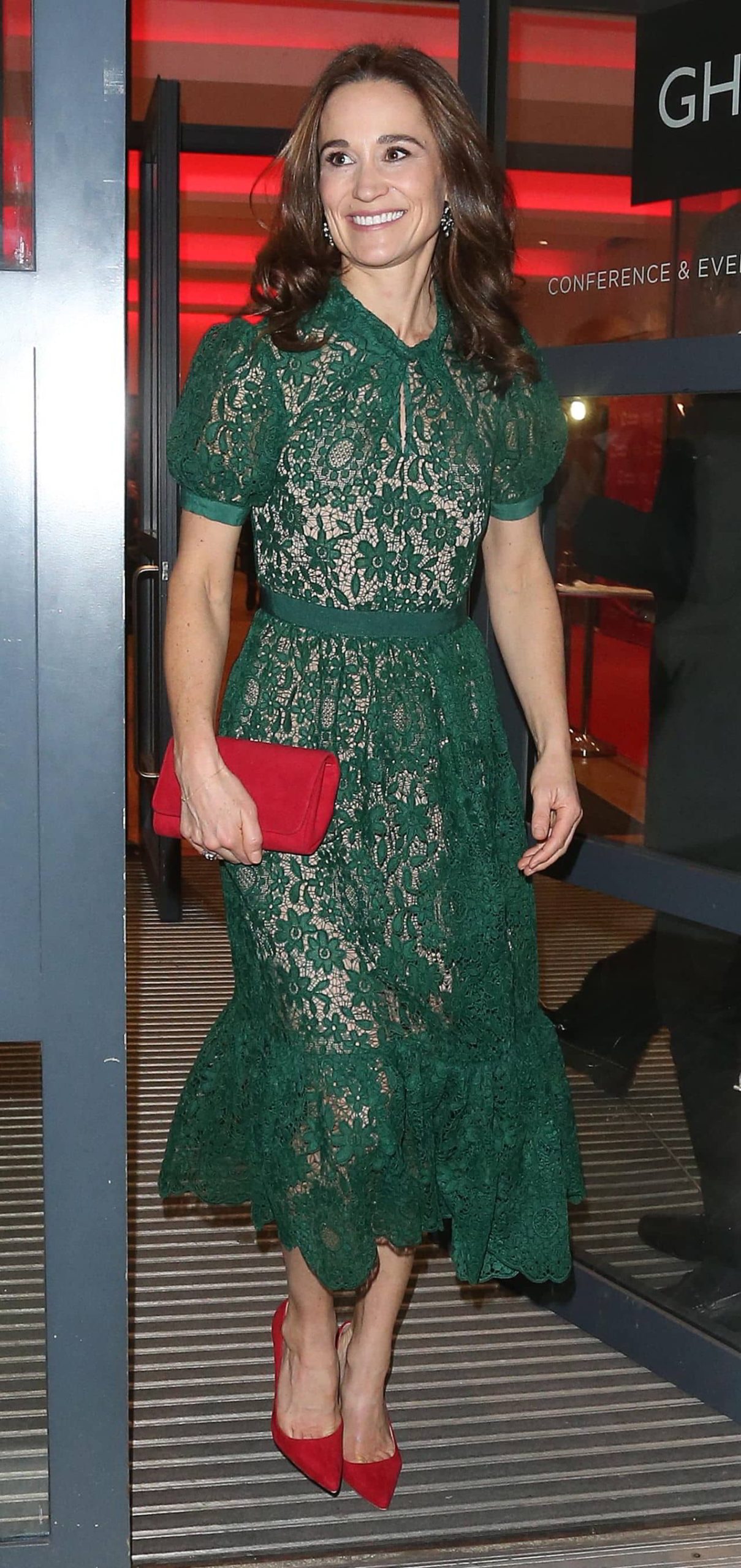 Pippa Middleton in a Green Lace Dress and Bright Red High Heels Matched with a Red Clutch Handbag at Heart Hero Awards in London, December 6, 2023 - 1