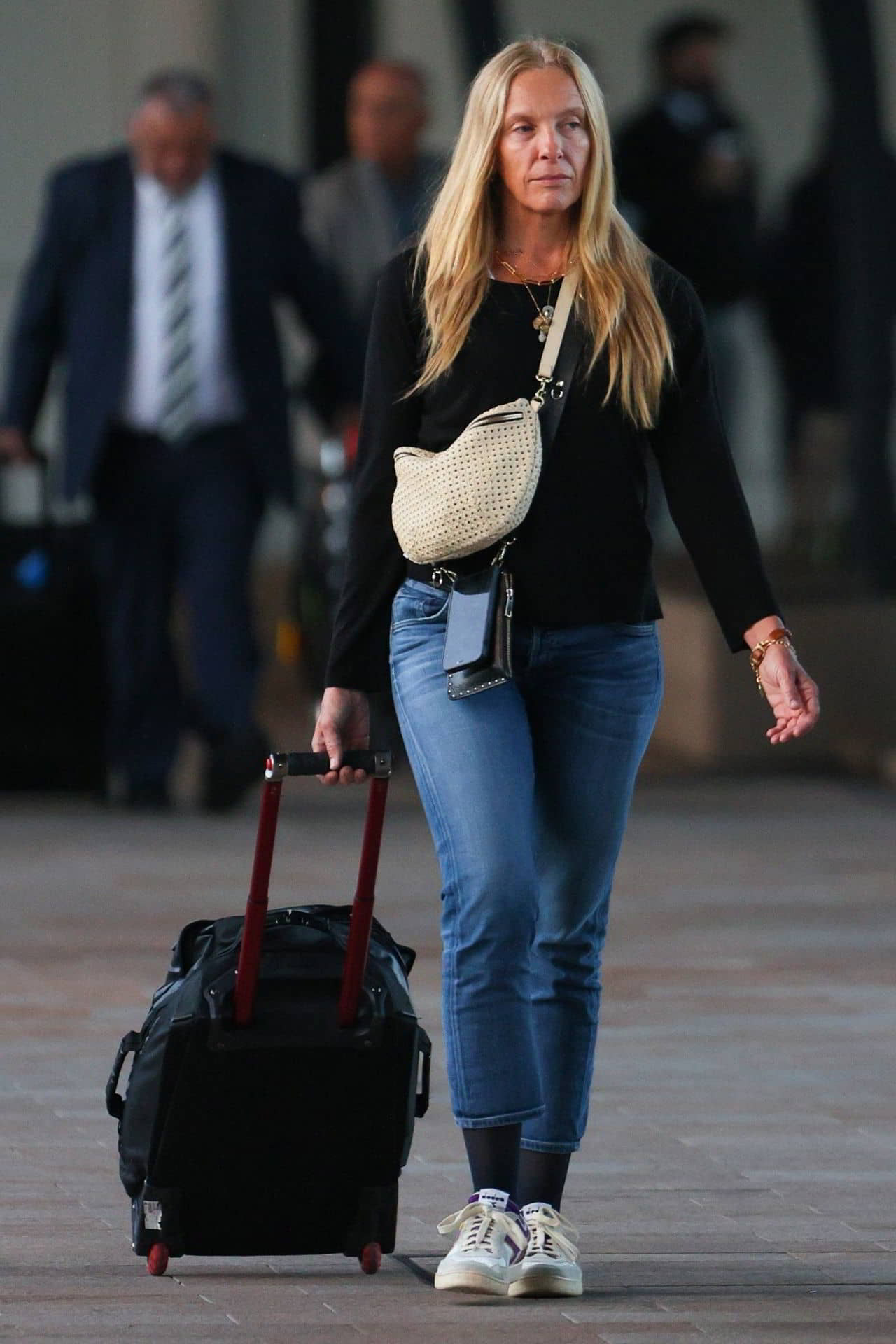 Toni Collette at Sydney International Airport, August 17, 2023 - 1