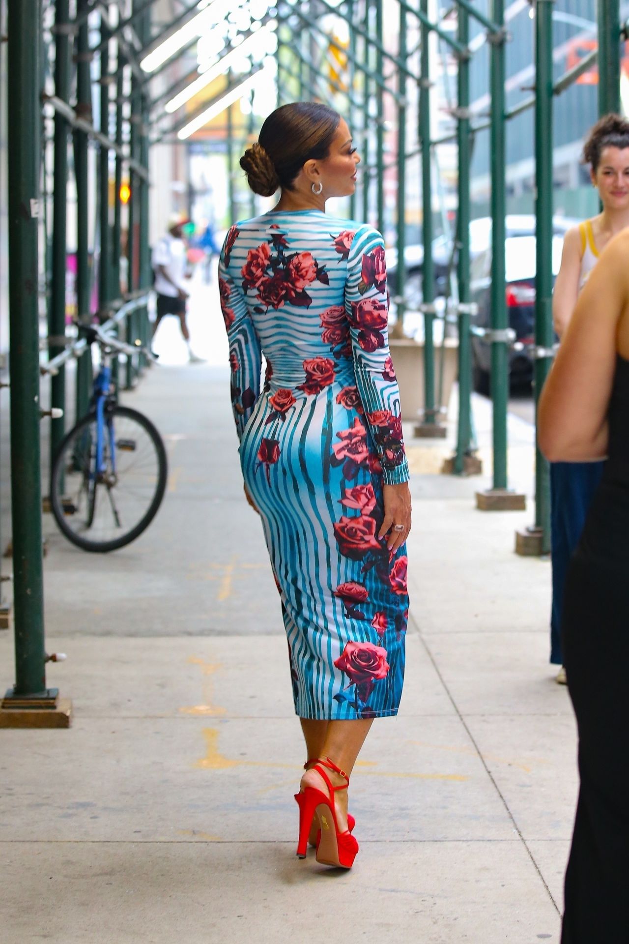 Dolores Catania Glamorous in a Red Rose Embroidered Blue Dress and Matching Red Heels in New York - April - 1