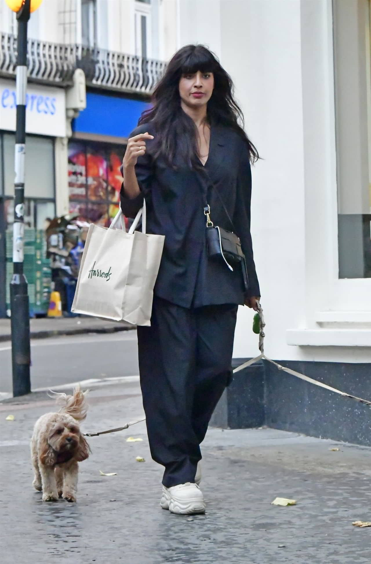 Jameela Jamil in Dark Suit and Harrods Bag Out in London - 1