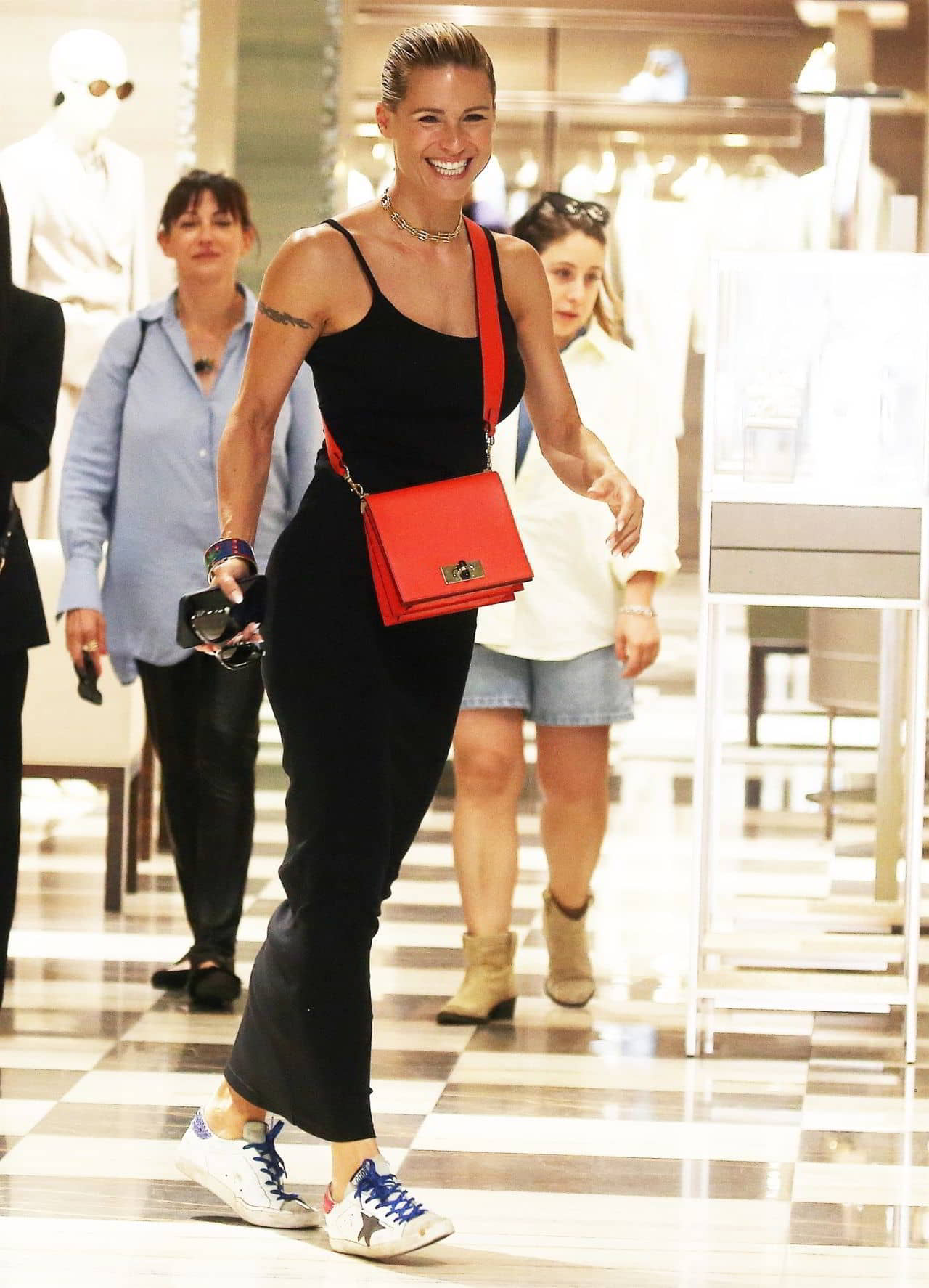 Michelle Hunziker Shopping at Armani Via Sant Andrea Milan July 2024 - 1