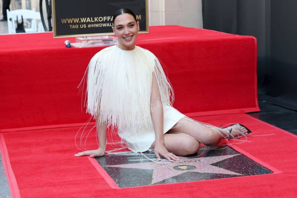 Gal gadot exudes timeless elegance in sleek saint laurent at walk of fame 02