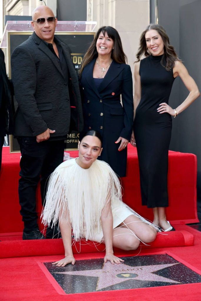 Gal gadot exudes timeless elegance in sleek saint laurent at walk of fame 15